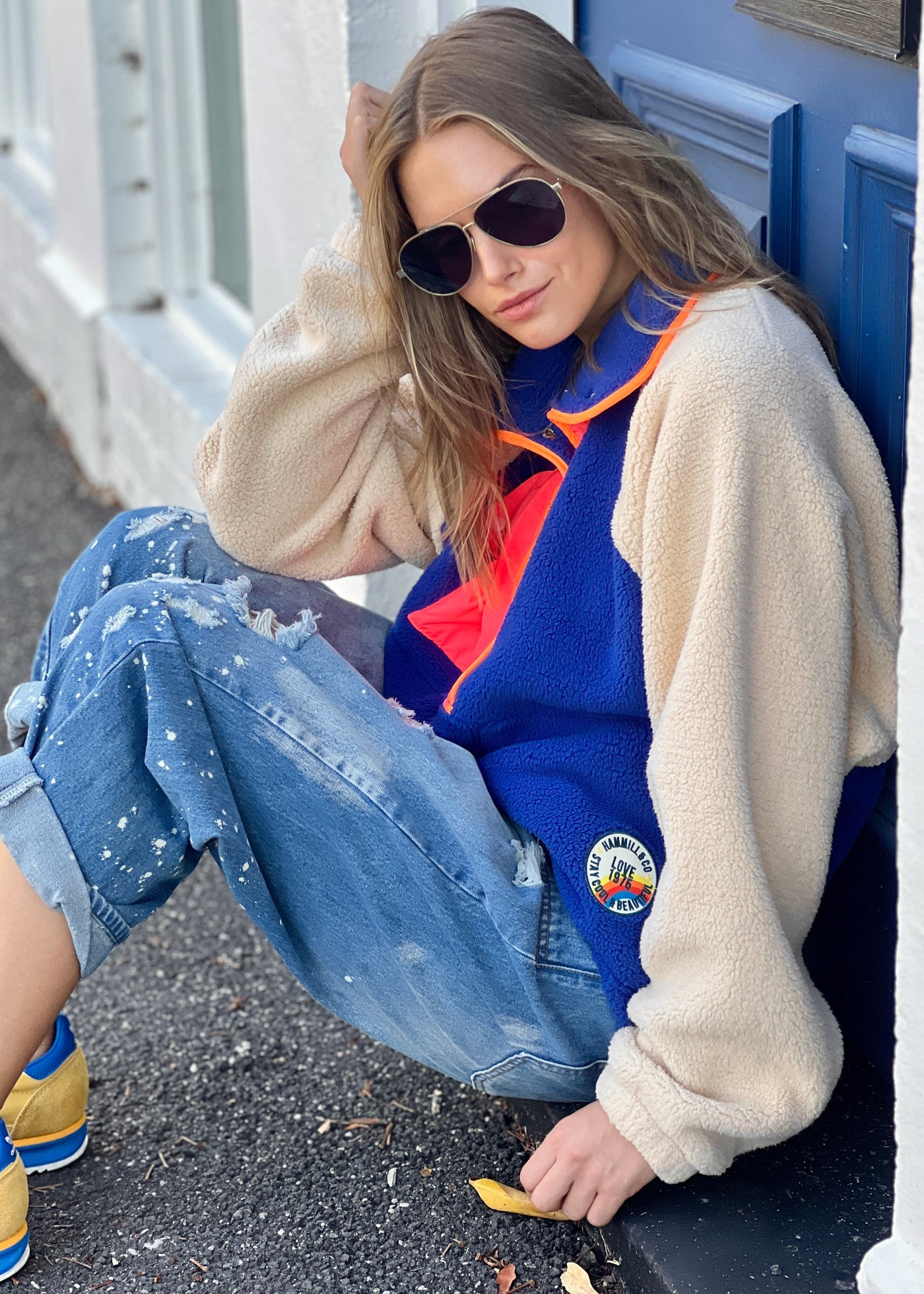 Hammill & Co super comfy and cozy new Alpes panelled polar fleece  with half button front in denim blue with raglan sleeves in a warm natural colour. Featuring contrast coloured front panel and orange coloured piping down the front. 