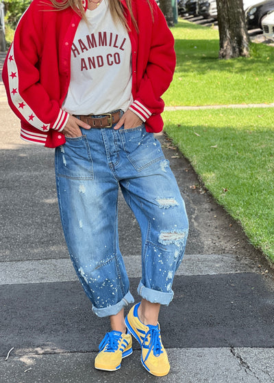 Hammill & Co Soft mid-blue colour stonewash non stretch denim
- Subtle paint splats, rips and holes for a lived in, vintage look.
- Slouchy utility pockets on the front and back
-  Waistband with belt loops.
- Concealed front button fly
