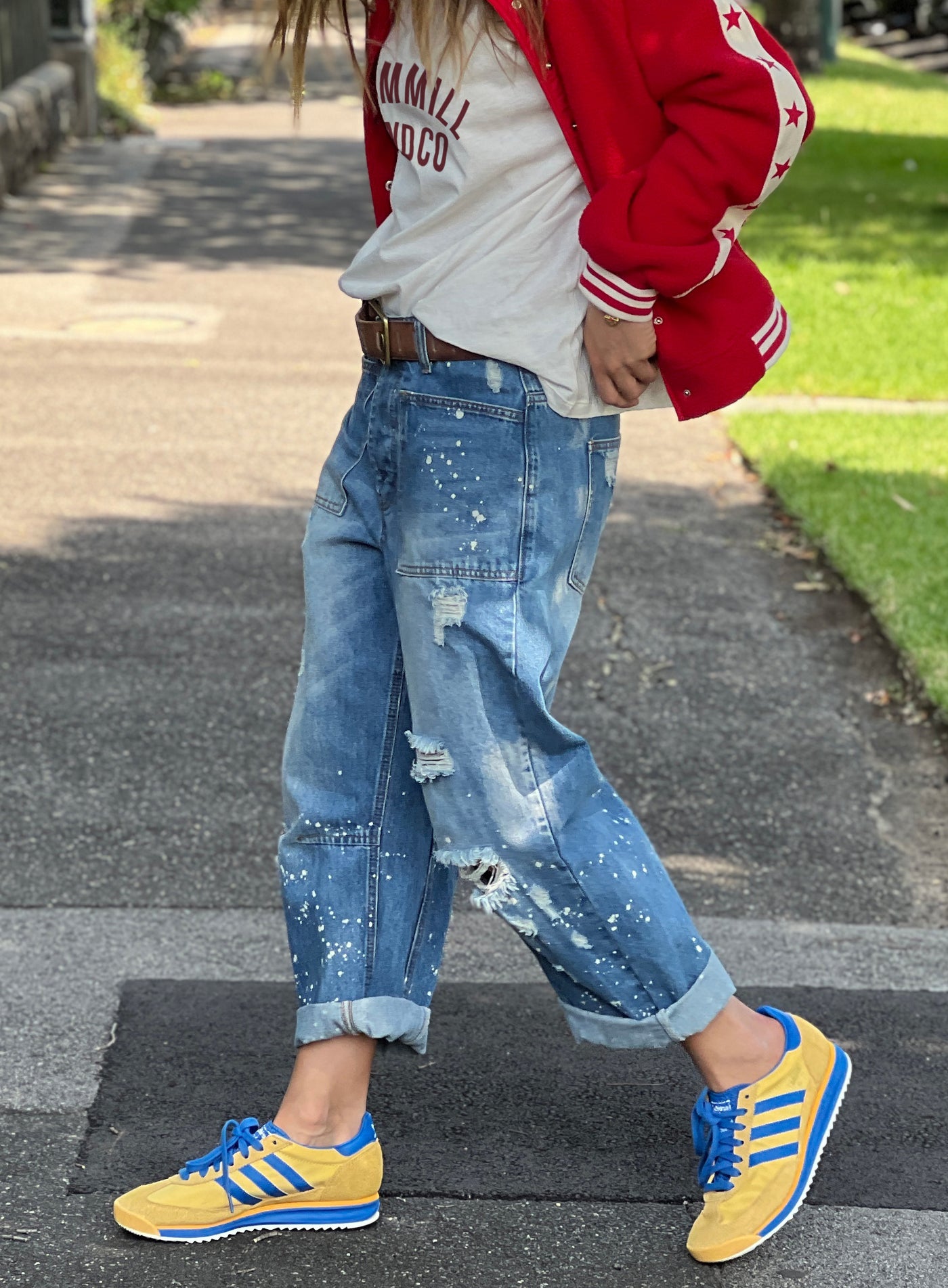 Hammill & Co Soft mid-blue colour stonewash non stretch denim
- Subtle paint splats, rips and holes for a lived in, vintage look.
- Slouchy utility pockets on the front and back
-  Waistband with belt loops.
- Concealed front button fly