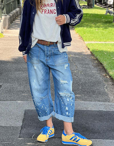 Hammill & Co Soft mid-blue colour stonewash non stretch denim
- Subtle paint splats, rips and holes for a lived in, vintage look.
- Slouchy utility pockets on the front and back
-  Waistband with belt loops.
- Concealed front button fly