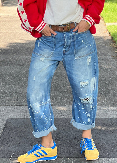 Hammill & Co Soft mid-blue colour stonewash non stretch denim
- Subtle paint splats, rips and holes for a lived in, vintage look.
- Slouchy utility pockets on the front and back
-  Waistband with belt loops.
- Concealed front button fly