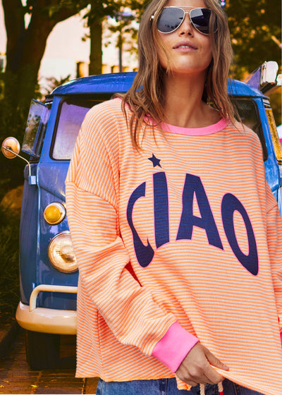 Hammill & Co Orange and white stripe rib waffle top with pink contrast rib and CIAO print on the front and keep smiling down the left sleeve. 