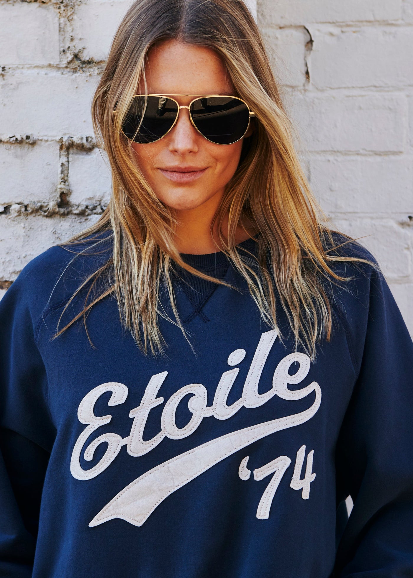 Hammill & Co New stretchy fabric sweat with beautiful brushed dark navy, fleecy on the inside. Features raw hem, raglan sleeve, Etoile '74 appliqué (Etoile is French for Star). A great fit and super comfy!