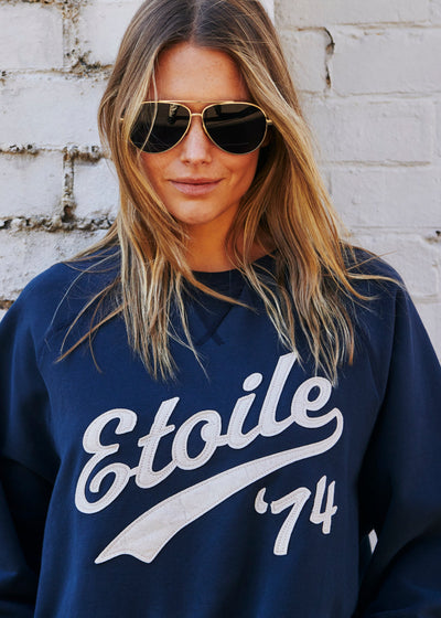 Hammill & Co New stretchy fabric sweat with beautiful brushed dark navy, fleecy on the inside. Features raw hem, raglan sleeve, Etoile '74 appliqué (Etoile is French for Star). A great fit and super comfy!