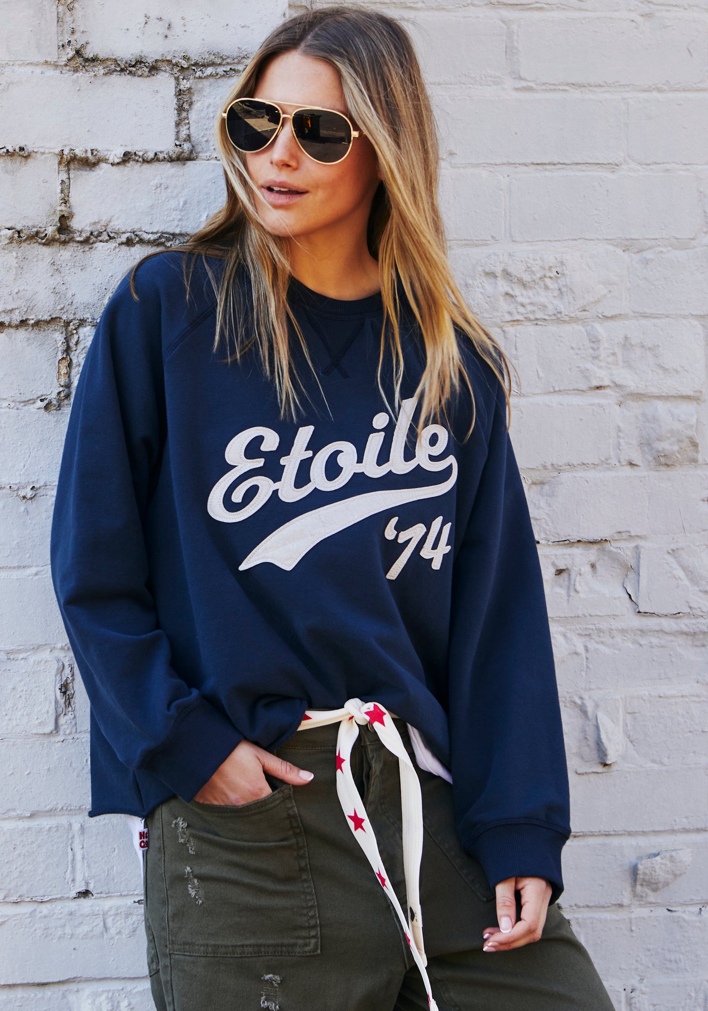 Hammill & Co New stretchy fabric sweat with beautiful brushed dark navy, fleecy on the inside. Features raw hem, raglan sleeve, Etoile '74 appliqué (Etoile is French for Star). A great fit and super comfy!