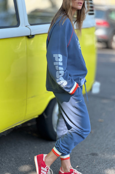 Hammill & Co New Sporty sweat is in a soft brushed fleece fabric in a washed denim blue colour with stripe rib cuffs. Cute printed Sporty print on the front and Word Series down each sleeve in washed white and Retro 1975 print across the back.