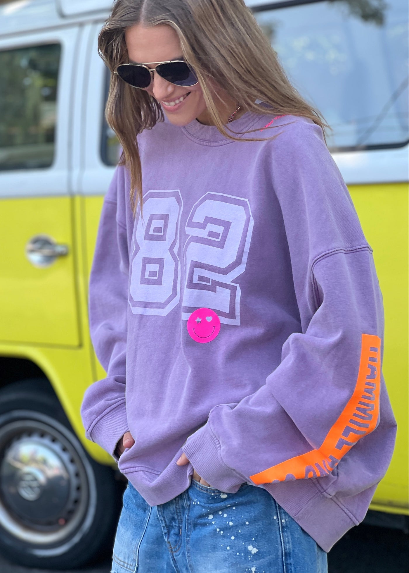 Hammill & Co  longer, slouchier style sweat  in our new garment washed fleece.  Washed white 82 print on the front and neon print down the left sleeve. Pops of hot pink and neon green! Happy vibes happy life embroidery at left side neck. 
Soft 100% Washed Cotton fleece. 