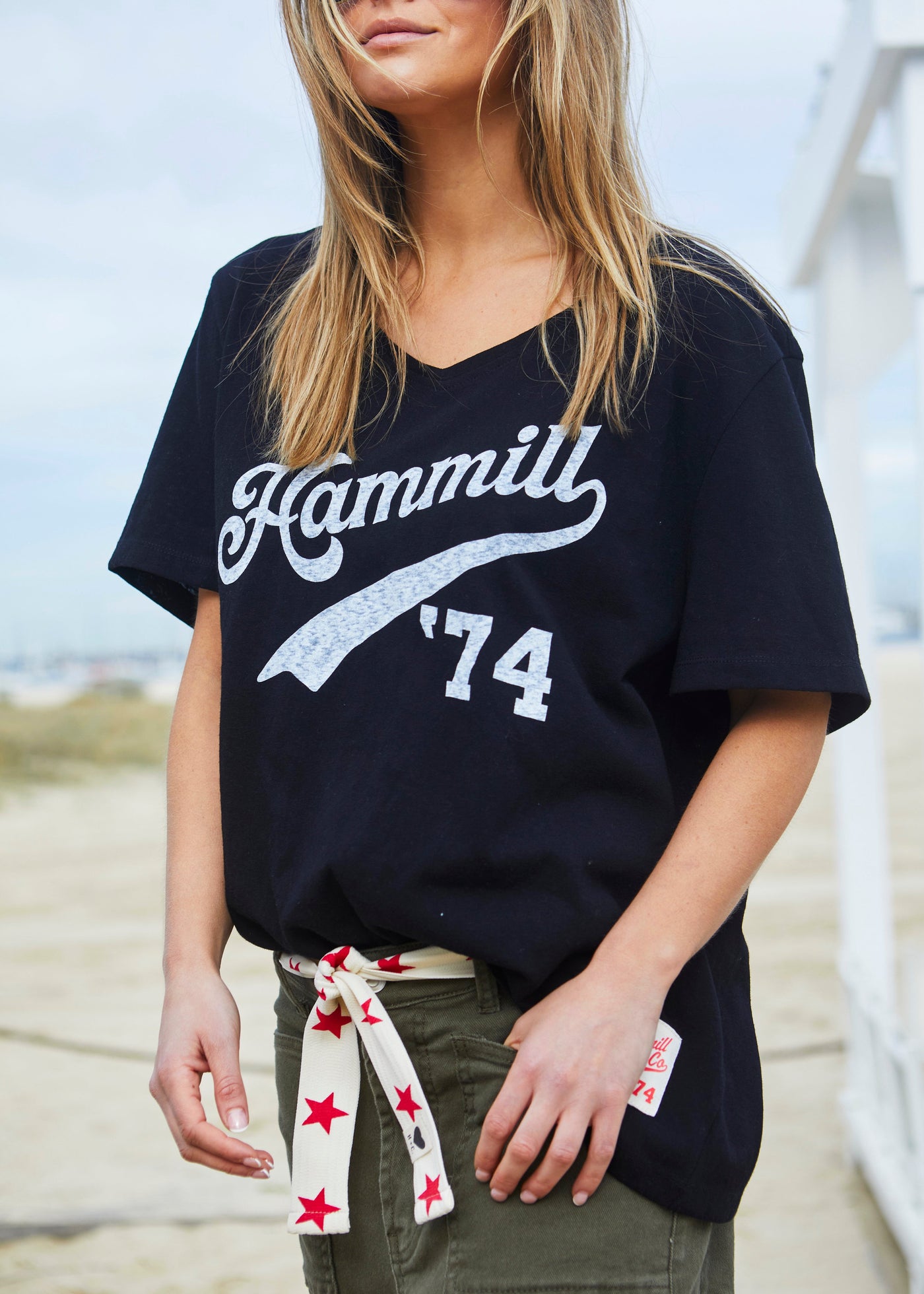 Hammill & Co Oversized best selling V neck tee in black with washed white Hammill '74 logo print on the front.