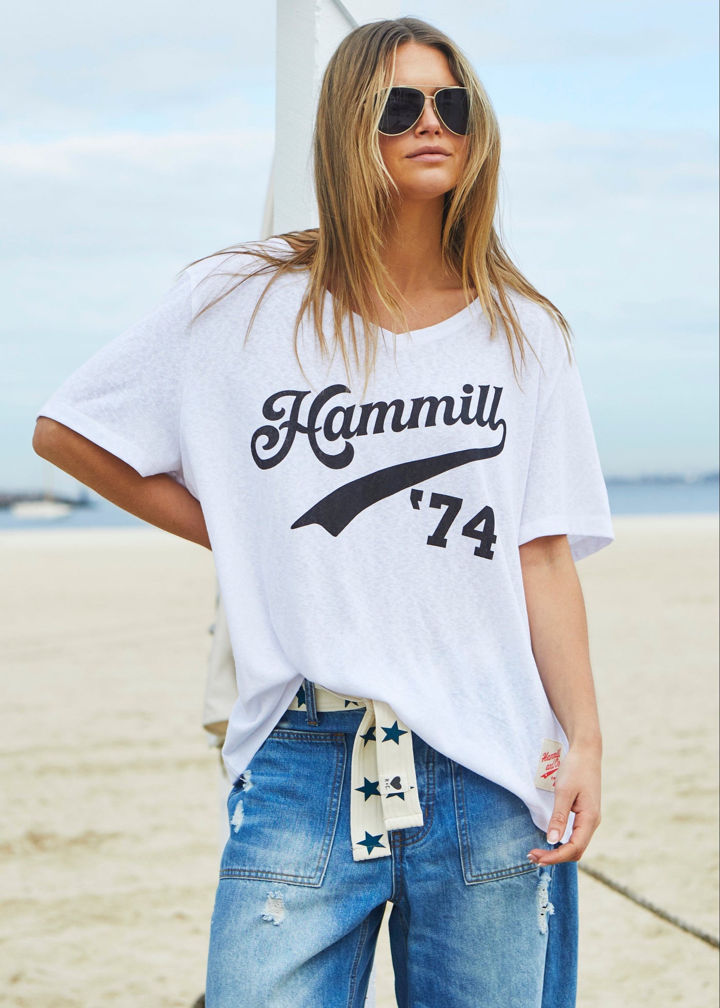 Hammill & Co Oversized best selling V neck tee in white with washed black Hammill '74 logo print on the front.