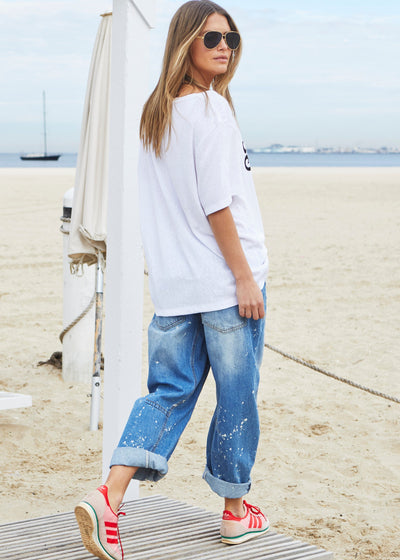 Hammill & Co Oversized best selling V neck tee in white with washed black Hammill '74 logo print on the front.