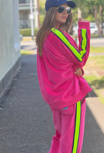 Hammill & Co slouchy sporty velour sweat in Hot pink with stripe tape down each sleeve and Sporty 75 chenille applique on the front.
