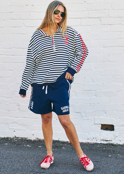 Hammill & Co Our newest sweat  features open collar with zip detail, slight drop sleeve, sporty stripes and straight raw-cut hem. This fit is relaxed, wider body but still enough length for good coverage!