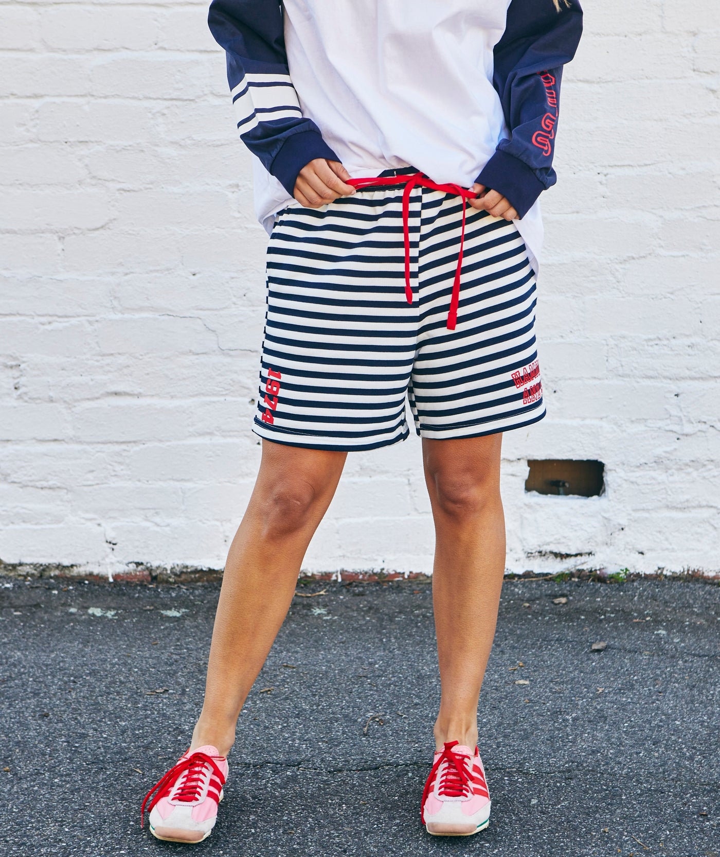 Hammill & Co Navy and white relaxed, comfy fleece short with elastic waist and contrast red draw cord. Our new fit is the perfect length for a casual look sitting just above the knee.