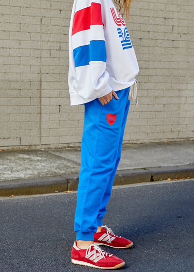 Hammill & Co Royal track pant with  Hammill & Co down the left leg and red heart on the right hip. Natural draw cord with elastic waist and slouchy pockets.