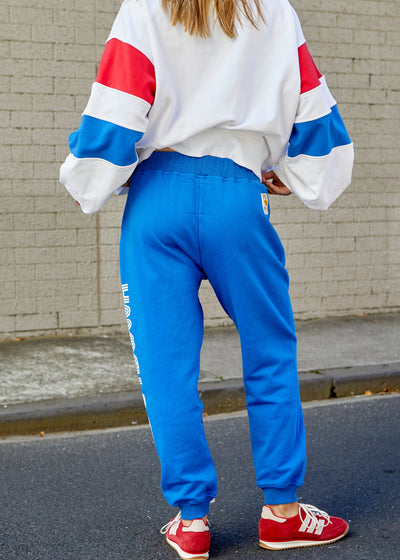 Hammill & Co Royal track pant with  Hammill & Co down the left leg and red heart on the right hip. Natural draw cord with elastic waist and slouchy pockets.