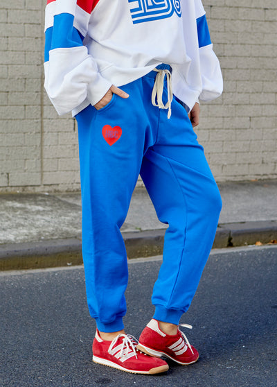 Hammill & Co Royal track pant with  Hammill & Co down the left leg and red heart on the right hip. Natural draw cord with elastic waist and slouchy pockets.