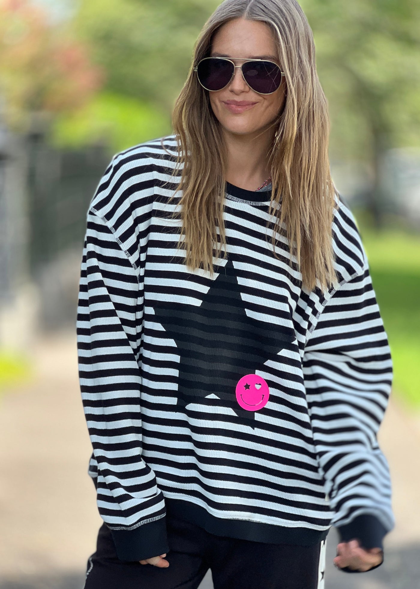 Hammill & Co Black and white stripe rib waffle top with contrast black rib collar and cuffs. New Star and smiling print on the front.