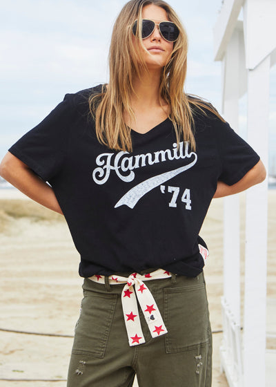 Hammill & Co Stretch natural tape with red stars printed on one side and the other side plain. The end has small H+C badge.