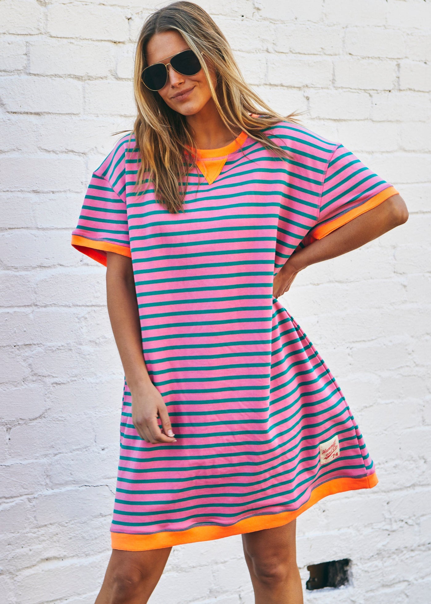 Hammill & Co This sporty beach dress is a relaxed, oversized striped tee-style dress designed for effortless coastal wear
