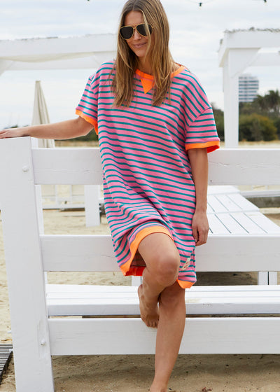 Hammill & Co This sporty beach dress is a relaxed, oversized striped tee-style dress designed for effortless coastal wear
