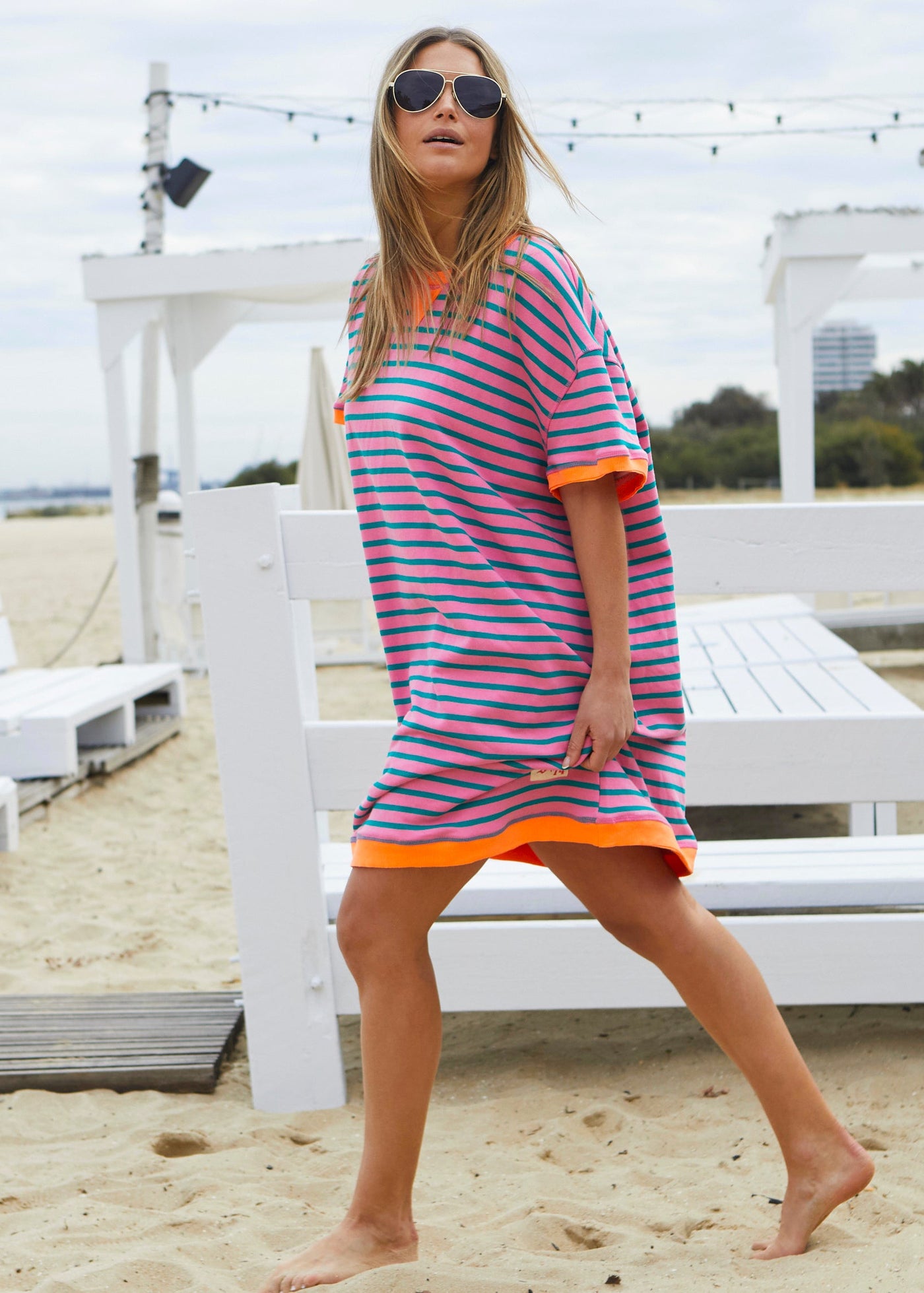 Hammill & Co This sporty beach dress is a relaxed, oversized striped tee-style dress designed for effortless coastal wear
