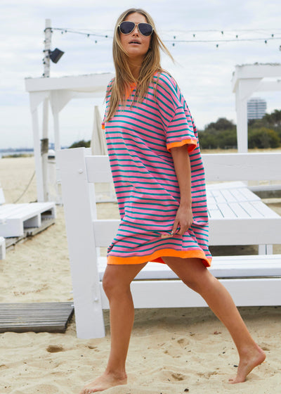 Hammill & Co This sporty beach dress is a relaxed, oversized striped tee-style dress designed for effortless coastal wear