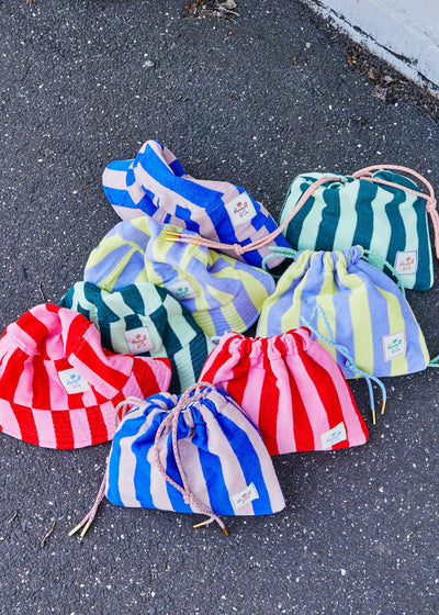 Hammill & Co adorable drawcord bag is bursting with colour and summer personality.