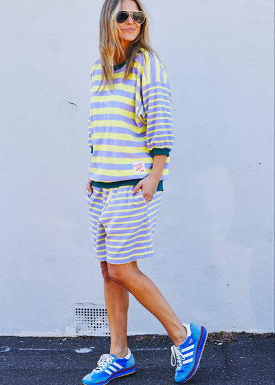Hammill & Co relaxed terry towelling stripe shorts bring effortless summer energy with their playful lemon and mauve stripes.