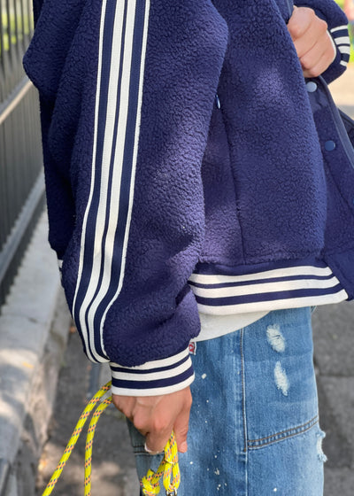 Hammill & Co cool relaxed bomber style  in superior quality polar fleece jacket with contrast natural and navy stripe tape down each sleeve.