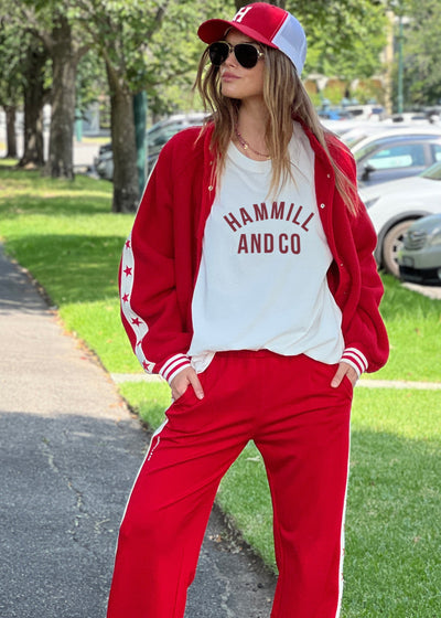 Hammill & Co cool relaxed bomber style  in superior quality polar fleece jacket with contrast natural tape down each sleeve with red printed stars.