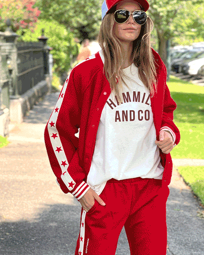 Hammill & Co cool relaxed bomber style  in superior quality polar fleece jacket with contrast natural tape down each sleeve with red printed stars.