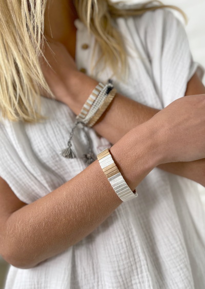 Hammill & Co Statement single elastic cuff bangle in brushed silver and gold.